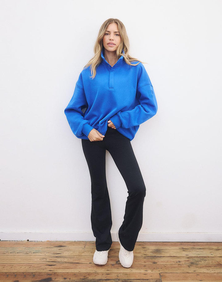 Alexis – Azure Blue Snap-Collar Unisex Sweatshirt