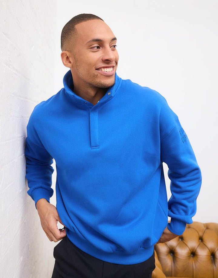 Alexis – Azure Blue Snap-Collar Unisex Sweatshirt