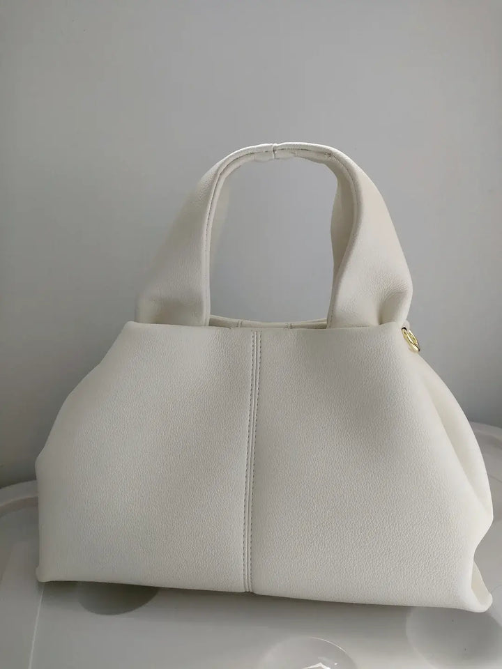 Ember – Women’s Dumpling Clutch Bag