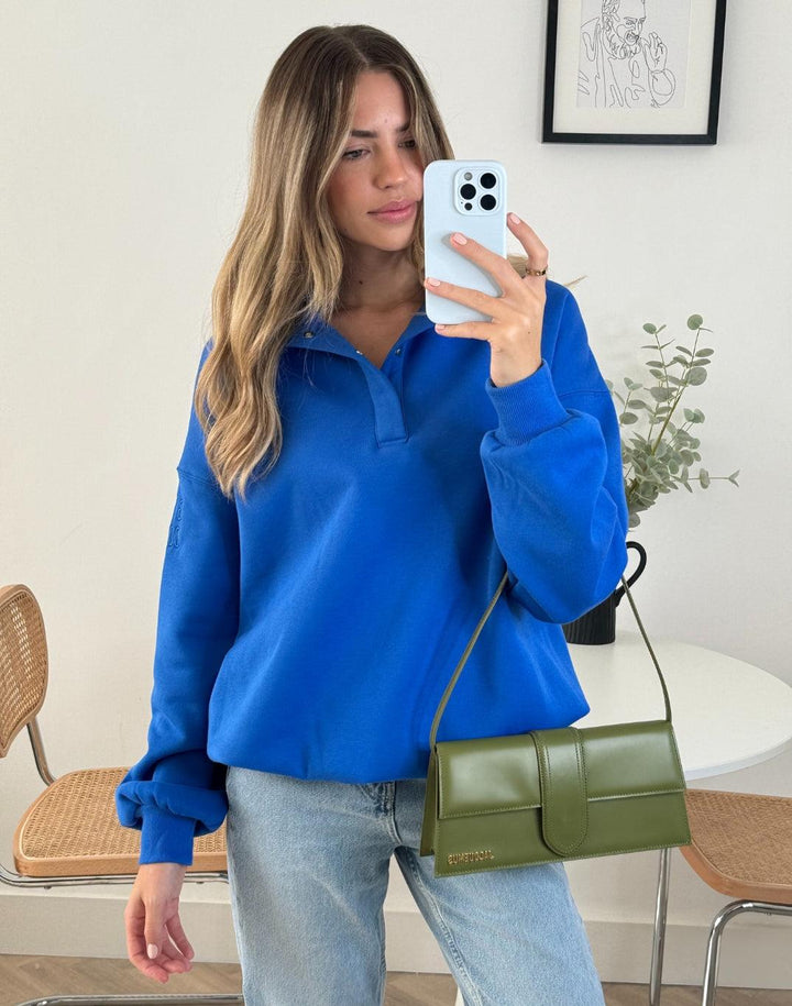 Alexis – Azure Blue Snap-Collar Unisex Sweatshirt